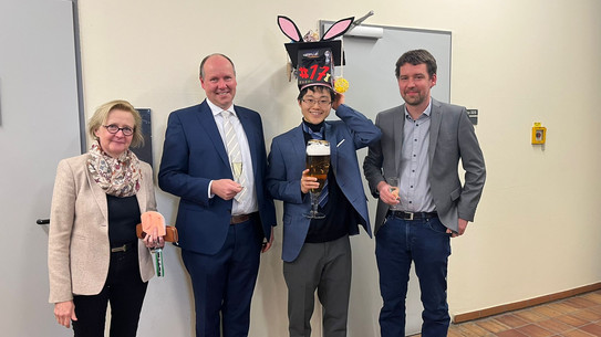 Picture of Shota Hasegawa together with the examiner after his PhD defense
