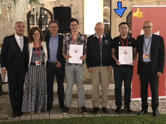 Picture of PhD student Bin Chen (poster price) together with another winner and the jury at the ISMSC 2019 in Lecce, Italy.